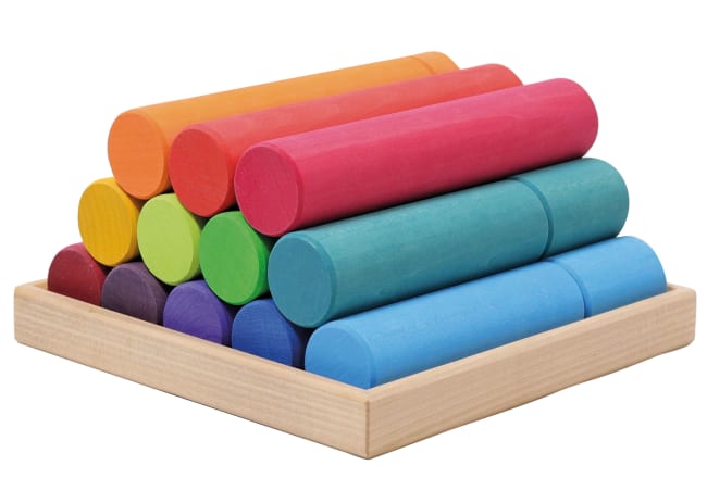 Grimms fargerike sylindre på brett