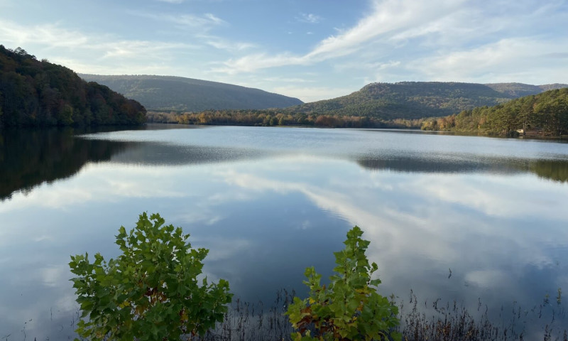 Beautiful view of lake with mountains in the background.