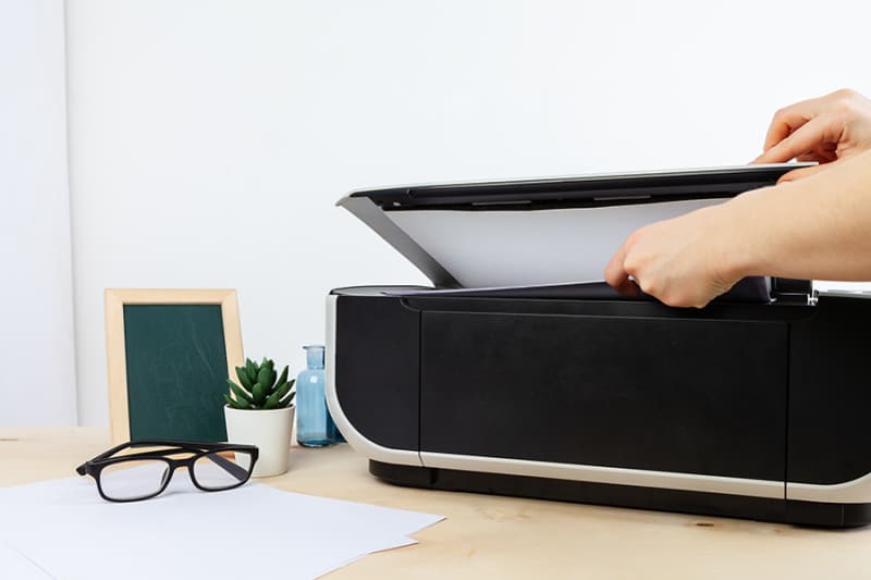 Hands of a woman using a scanning machine close up