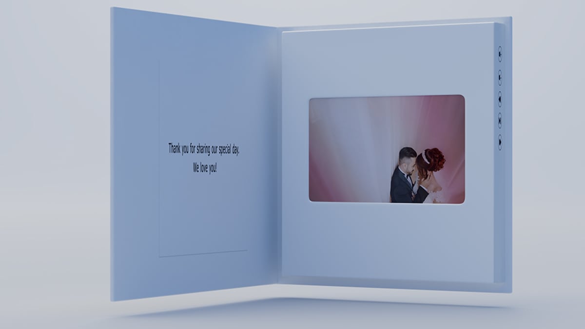 Opened video book showing HD screen playing a Mother's Day slideshow