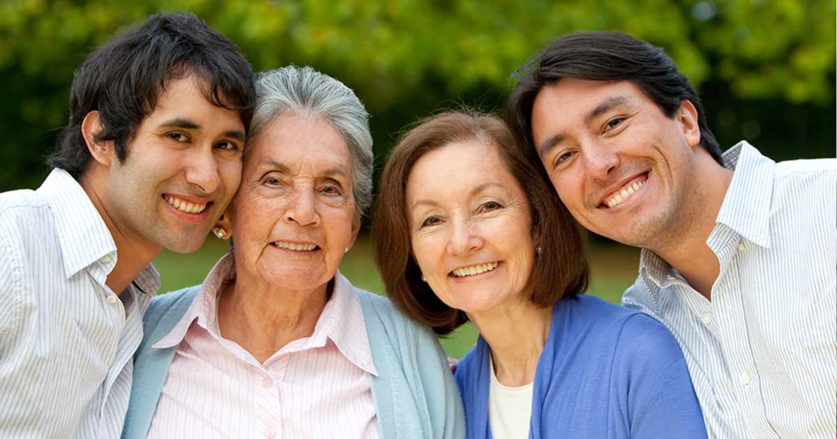Family celebrating Mom with a personalized slideshow