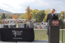Milligan College President Dr. Bill Greer delivers remarks at the Milligan Village Dedication Friday.