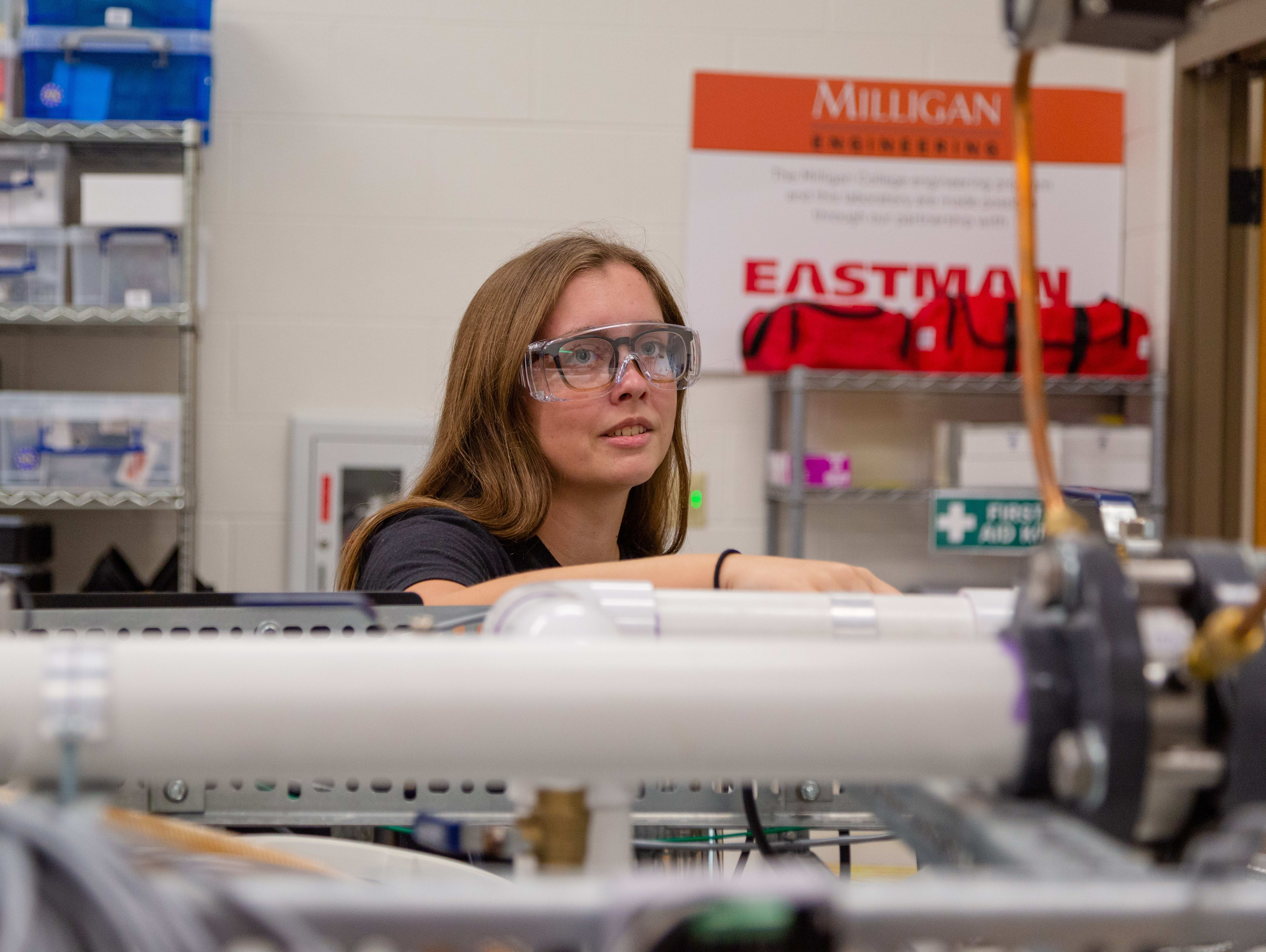 Female engineering student in Milligan lab