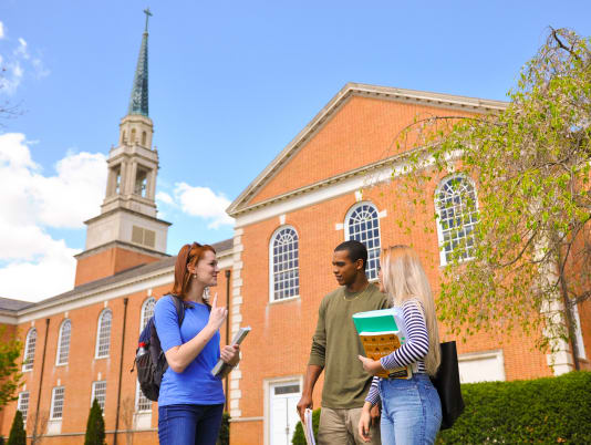 Milligan University students talking outside Seeger Chapel