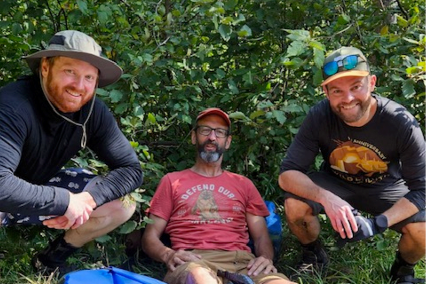 A photo of MinnOrch musicians Kyle Sanborn and Dave Auerbach, who helped Pete Heaslett (center) get to emergency care after an accident on the BWCA. 