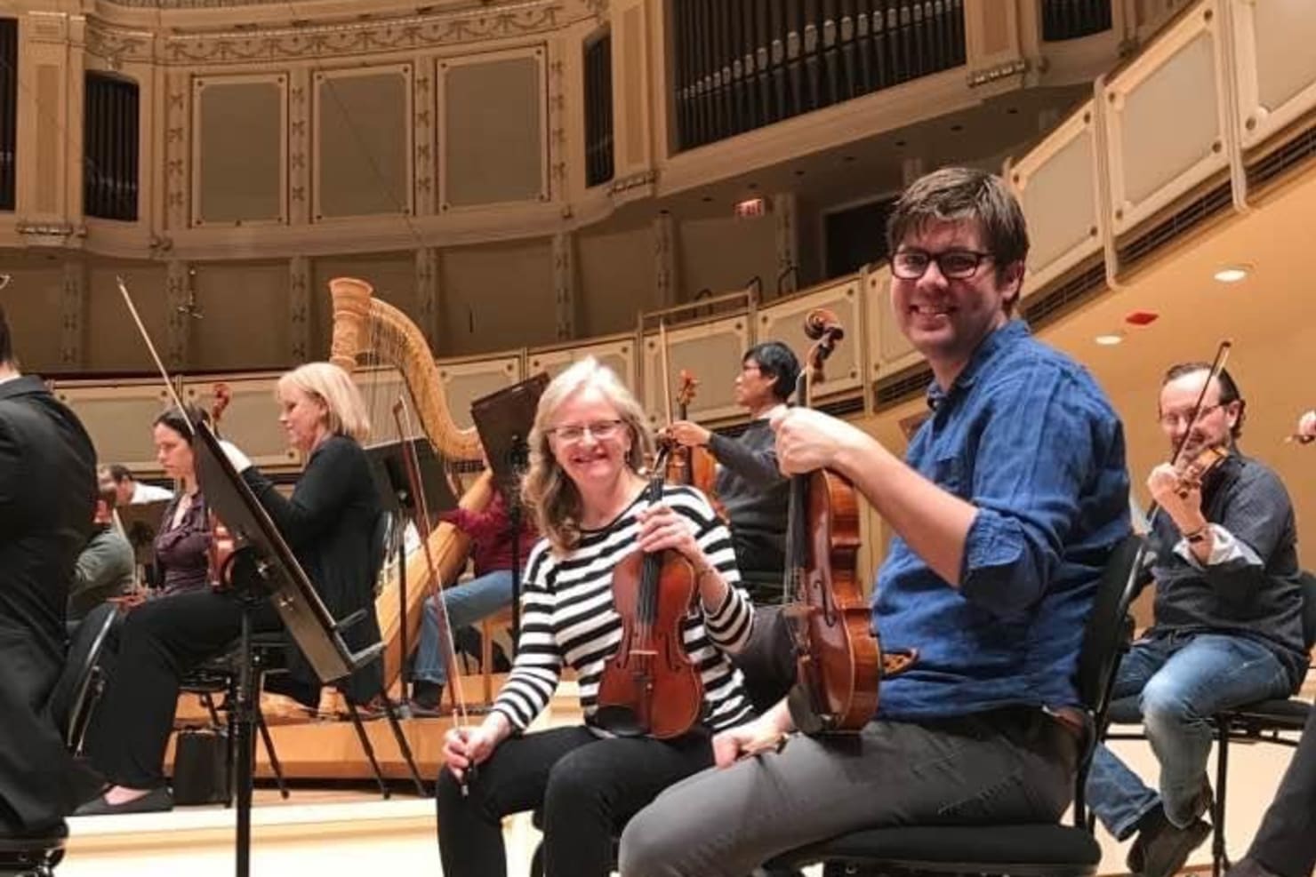 Jean seated with substitute musician James Garlick at the January 2018 Minnesota Orchestra performance at Symphony Hall in Chicago.