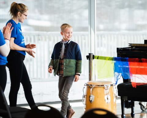 Volunteers helping with children activities