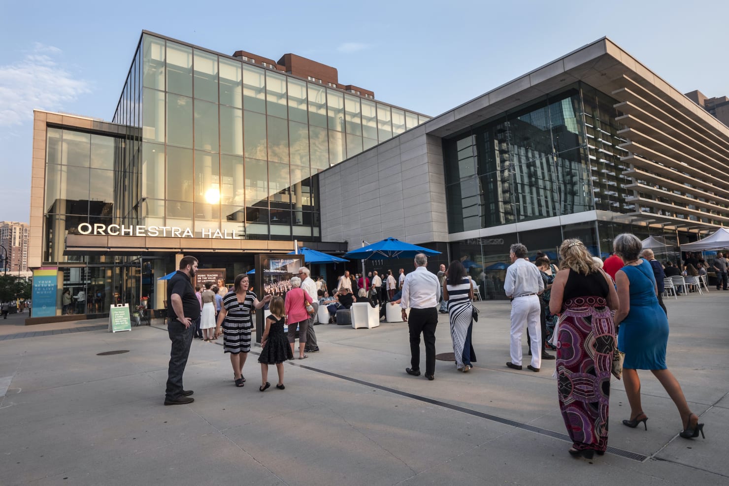 Patrons mingling outside during summer