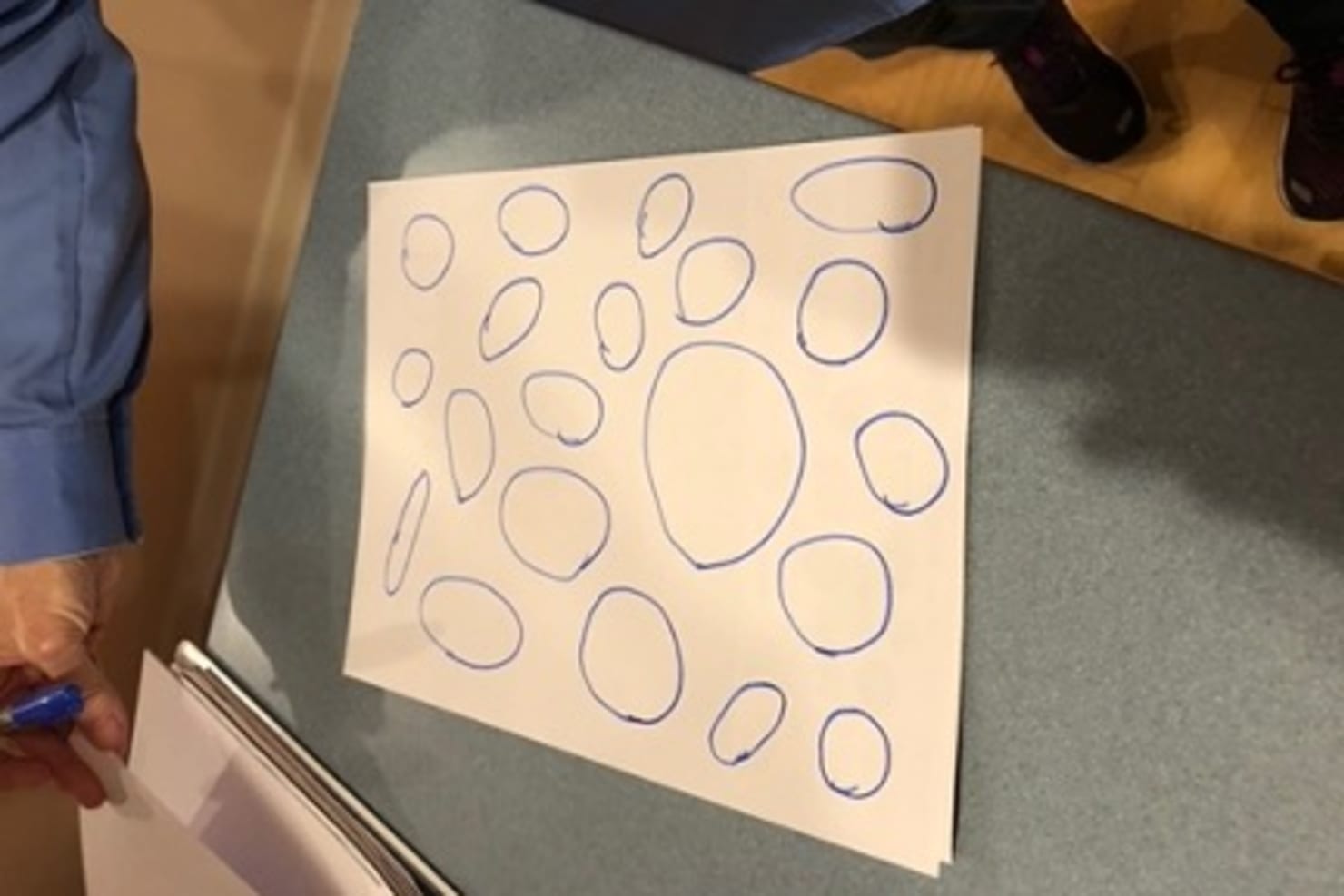 Person drawing circles