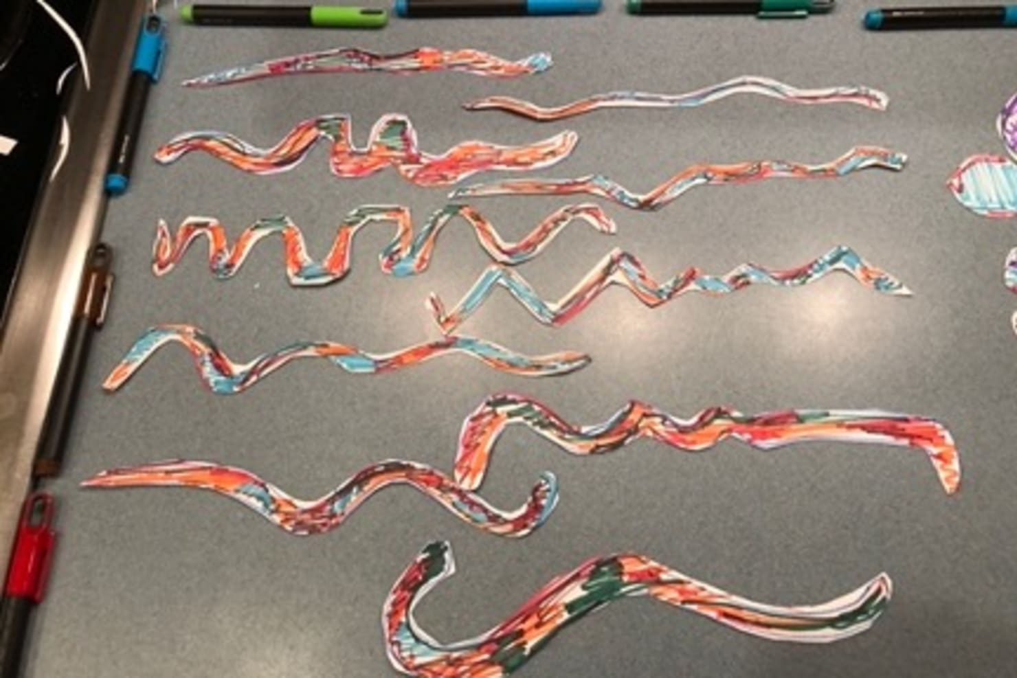 Colorful cut outs of squiggles