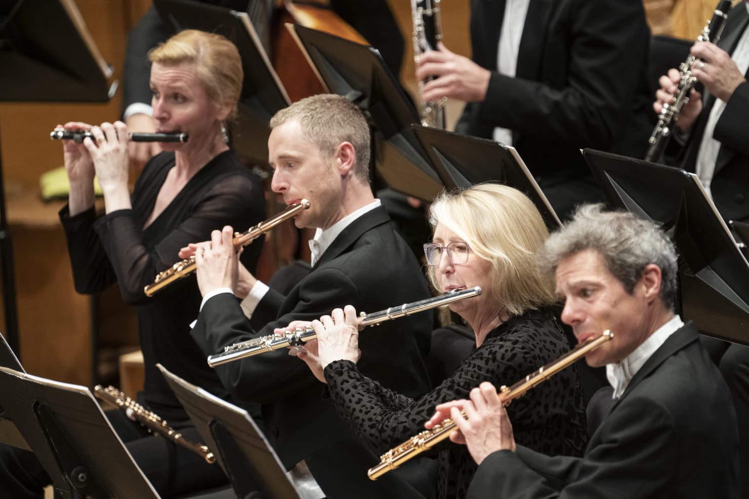 The Minnesota Orchestra's flute section in a June 2019 performance of Mahler's Tenth Symphony: piccolo player Roma Duncan, Associate Principal Flute Greg Milliren, Wendy Williams and Principal Flute Adam Kuenzel.