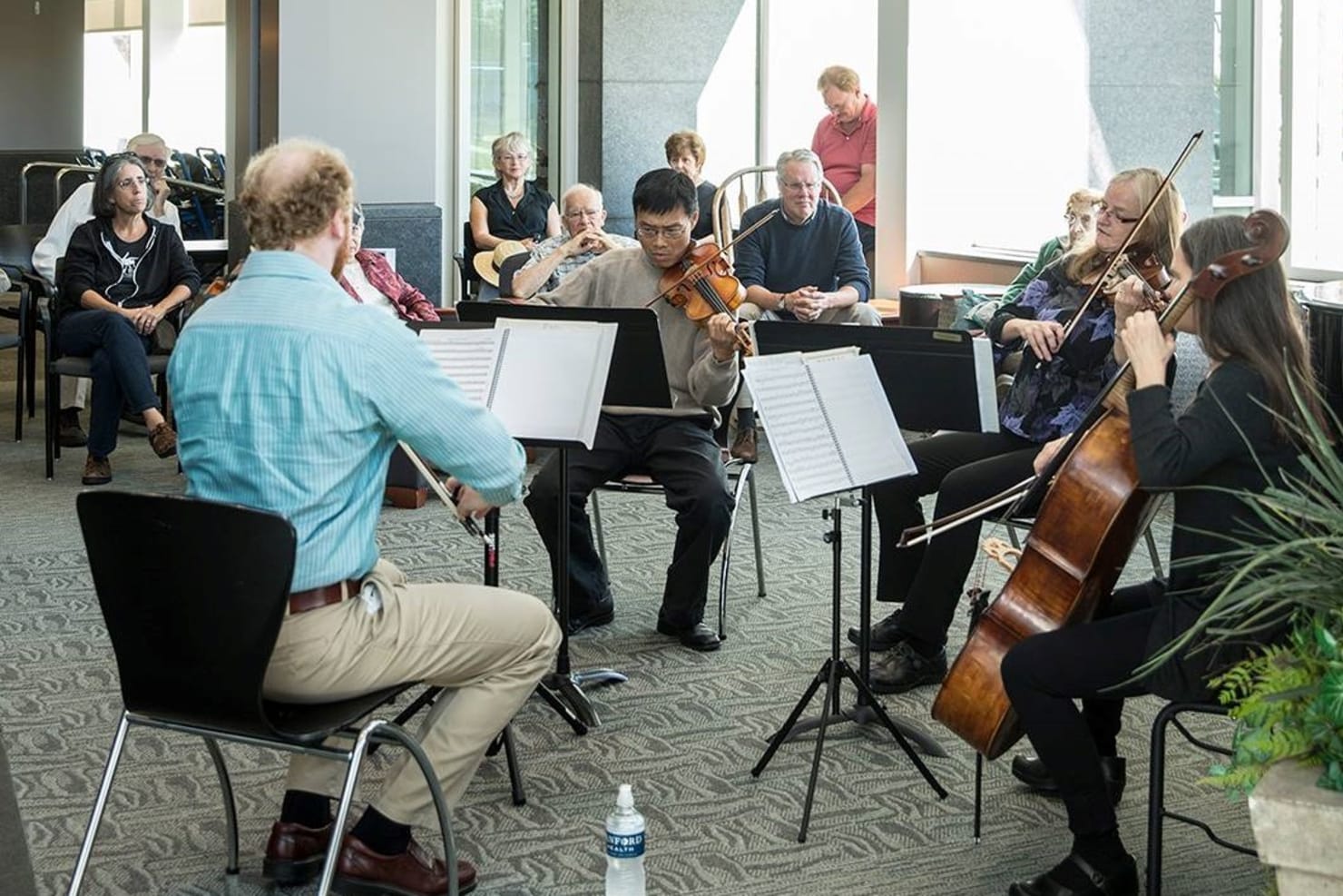 Taichi Chen, Jean Marker De Vere, Gareth Zehngut and Kristin Whitson performing at the Bemidji Sanford Hospital