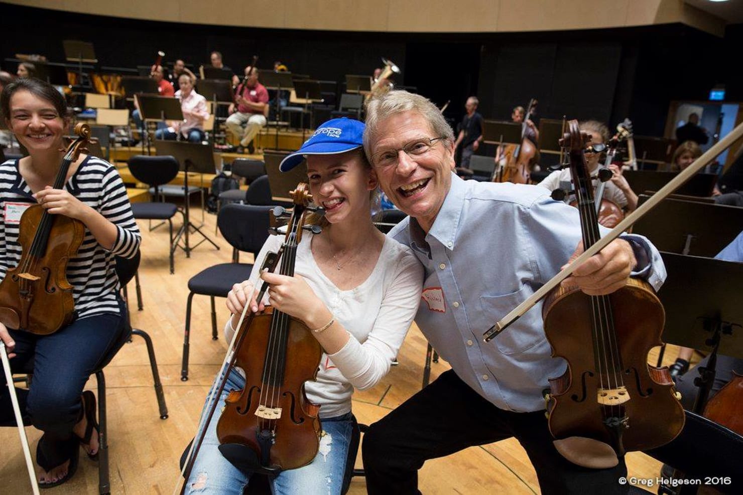 Richard Marshall onstage with a student at Sibeliustalo in Lahti, Finland