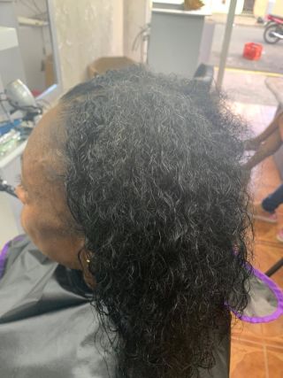 Estilo de cabello rizo