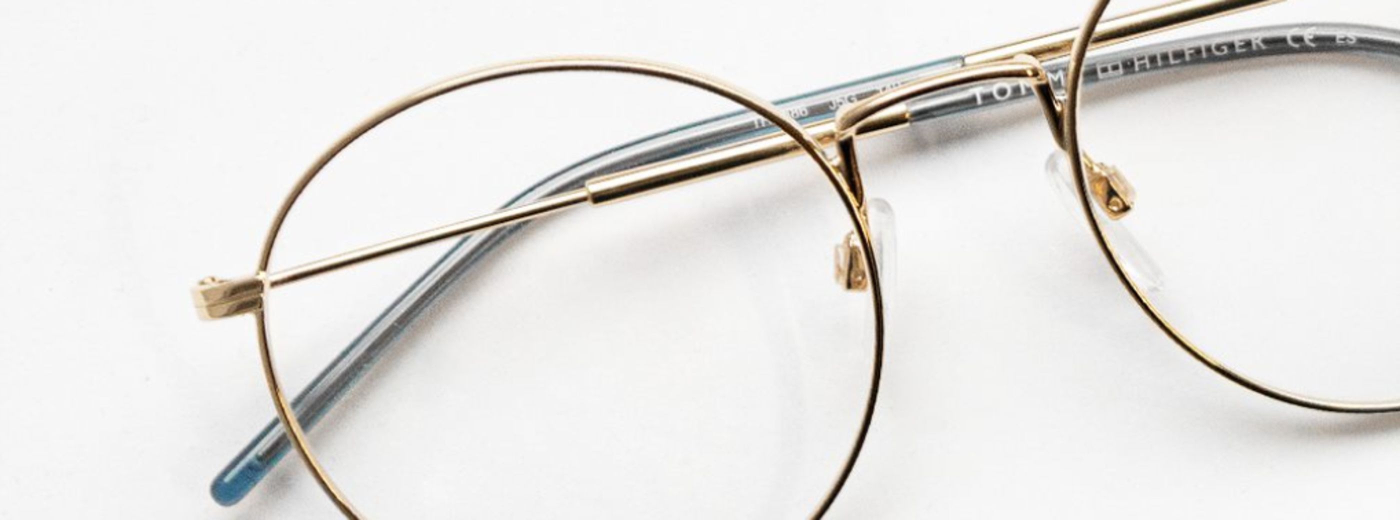 Round frame with golden metal frame