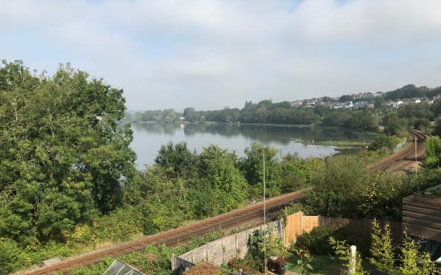 Private room in 1930's semi detached house with stunning river views.