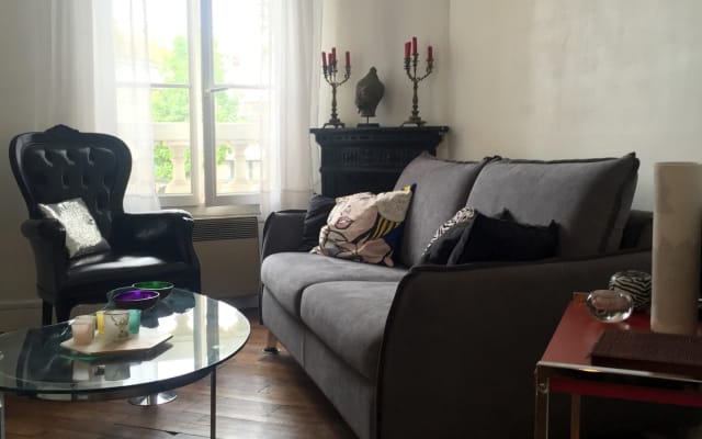Sofa bed in living room near Sacré-Coeur