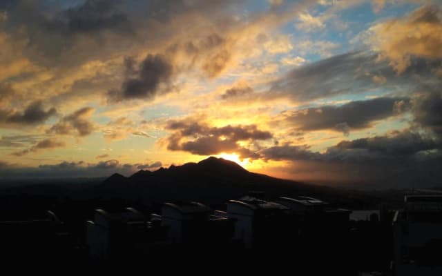 Quarto de apartamento tranquilo com uma esplêndida vista para a...