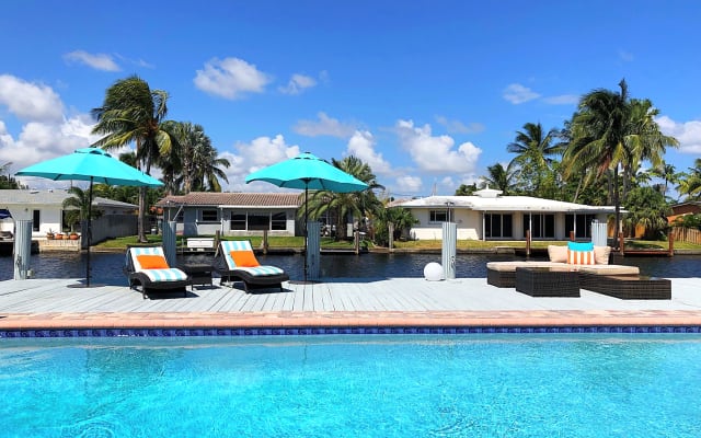 Waterfront Oasis w/ Pool + Sunset Views & Dock
