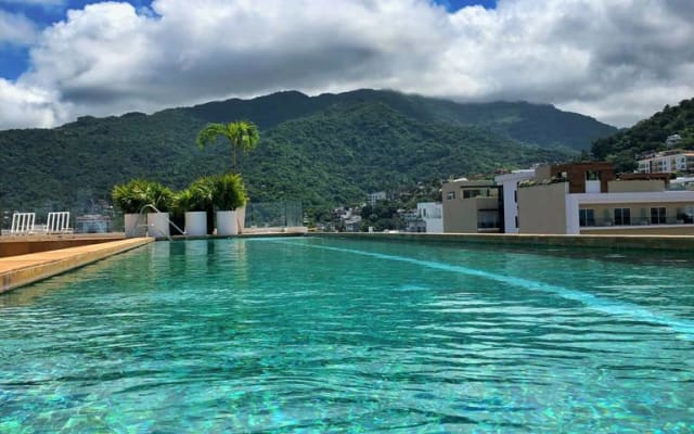 Christian's listing on misterb&b - Rooftop pool deck with mountain view