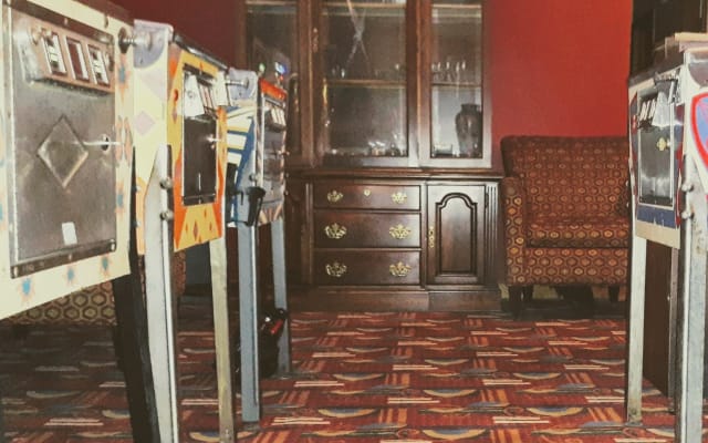 Basic Room, clean, safe place with vintage pinball and game consoles.