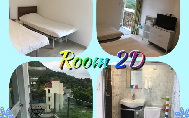 Quarto com duas camas individuais e varanda 東涌鄉村舒適雙床露台房