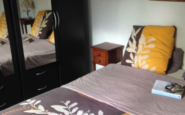 Shared bedroom in a house with garden