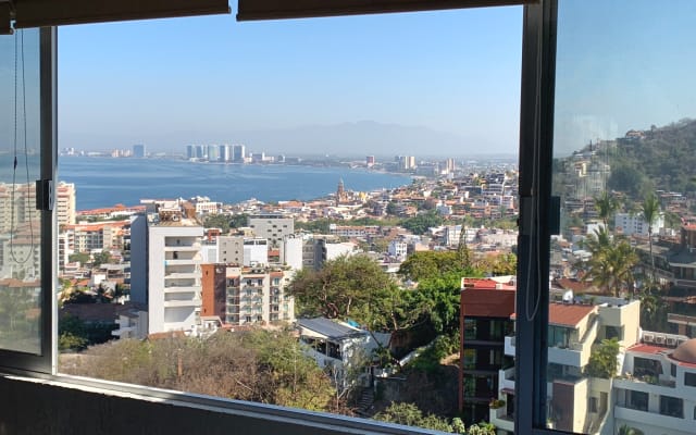 Zone romantique Condo avec vue sur l'océan et toit privé