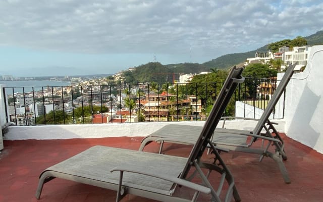 Zone romantique Condo avec vue sur l'océan et toit privé