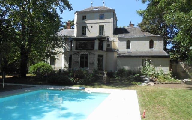 Appartement Magnolia avec vue sur la piscine et le parc du clos