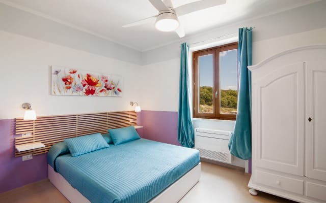 Quarto Superior com vista para o Parque Maremma