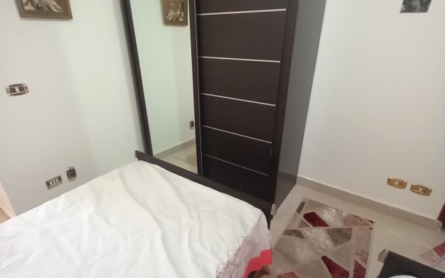 Quarto com cama privada num deslumbrante apartamento com vista para o...