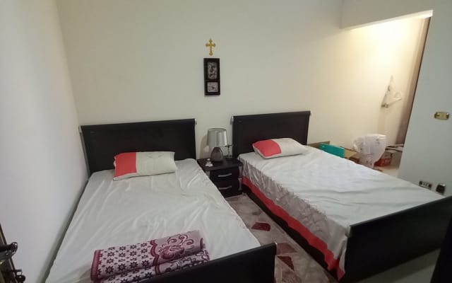 Quarto com cama privada num deslumbrante apartamento com vista para o...