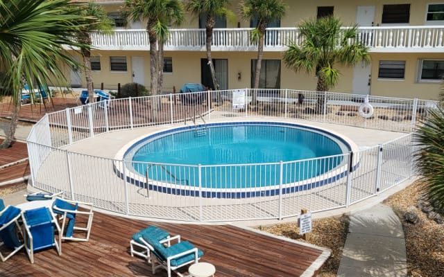 Entire 2 bedroom 1 bath beachfront condo with pool, quiet area