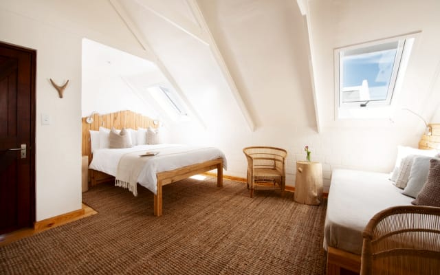 Gonana Guesthouse - Dreibettzimmer mit Balkon