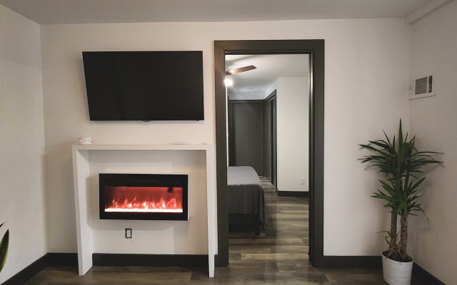 Private modern apartment with indoor fireplace