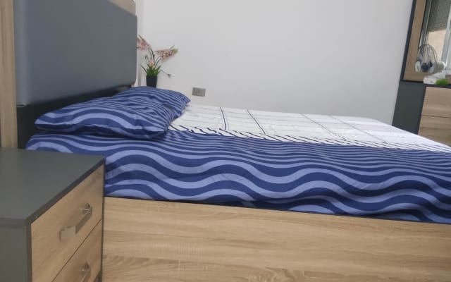 Quarto privado num apartamento com localização perfeita perto da...