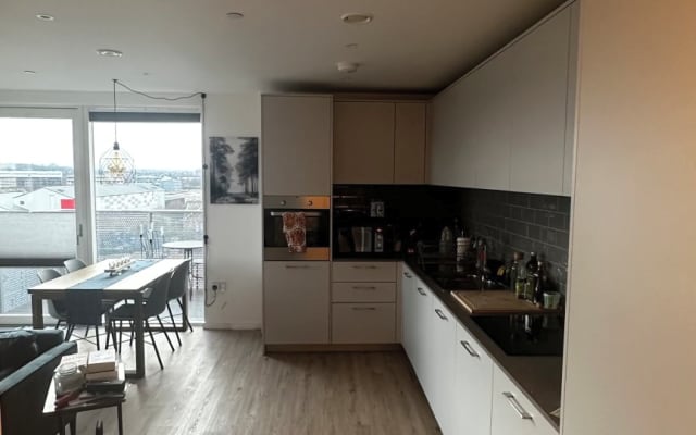 Guest room in modern apartment with private bathroom