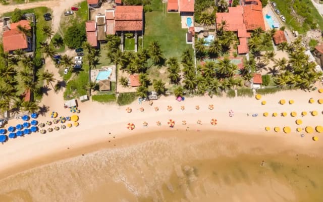 Beach house by the sea, natural pool, lawn, leisure area, furniture