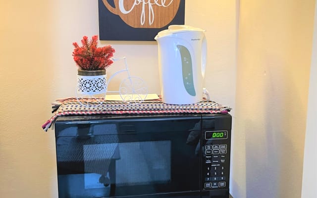 Kenny And Gal's listing on misterb&b - Microwave, Kettle, Coffee kit and a small refrigirator