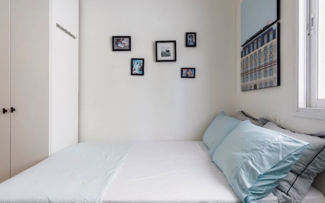 Quarto acolhedor num apartamento com estilo no centro da praia