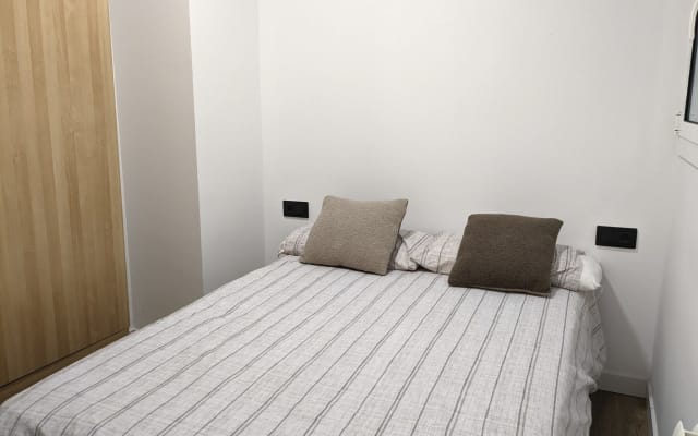 Quarto num apartamento moderno no bairro de Gràcia