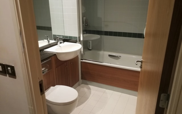 Comfy couch in the living room area - Picture 9