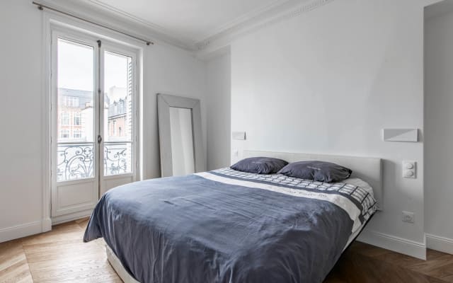 Elegant bedroom with private bathroom