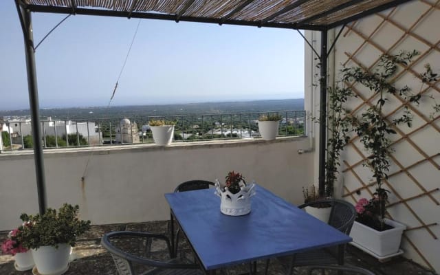 Quarto no centro com vista para o mar e terraço privado