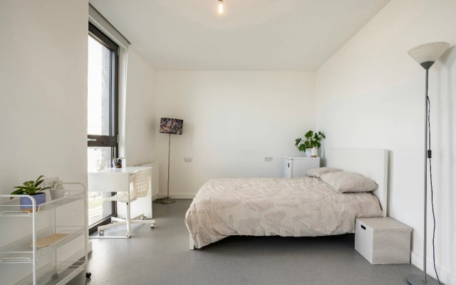 Beautiful riverside view room with sleeping to floor to ceilingwindows