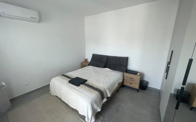 QUARTO num apartamento novo PARTILHADO perto do centro da cidade