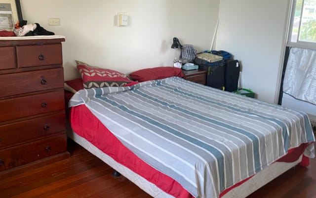 Semi furnished bedroom near city center.