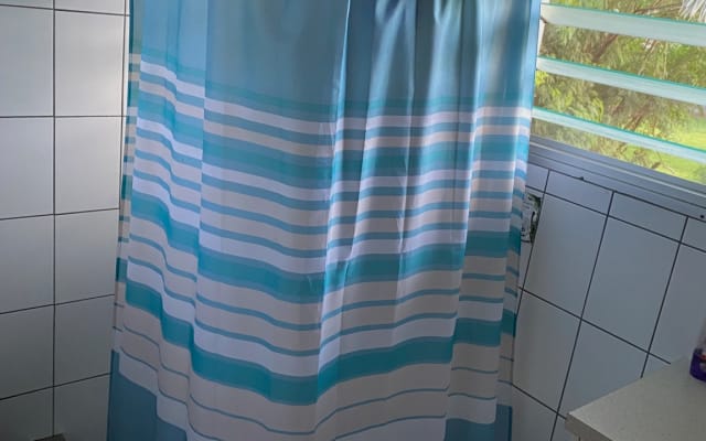Semi furnished bedroom near city center.