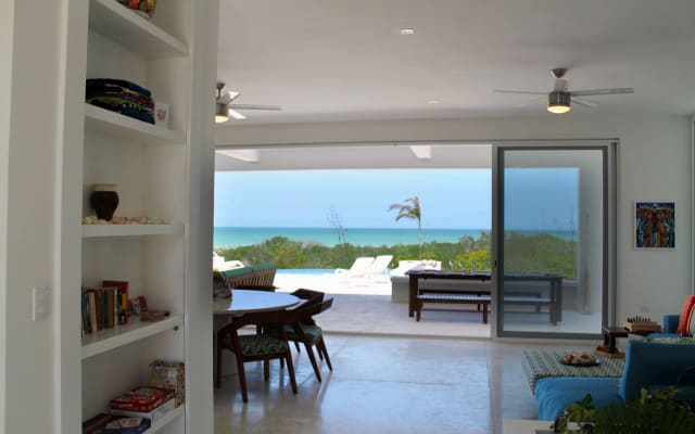 Private Suite w Full Ensuite: Atemberaubendes Strandhaus mit Meerblick